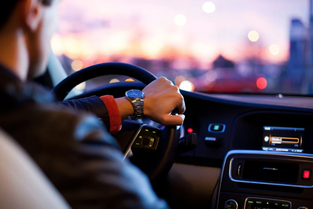 A chauffeur driving a car
